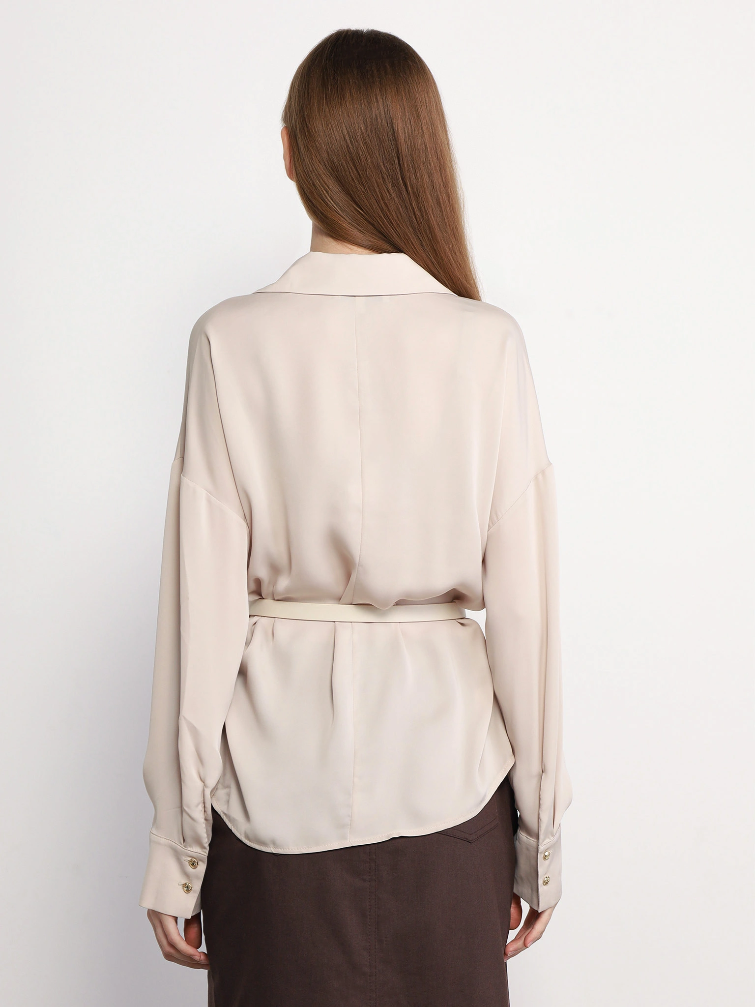 Блуза бежевого цвета с рюшами